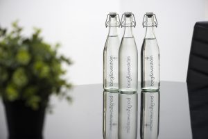 Keep your team hydrated with our swing-top glass water bottles